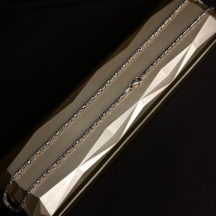 Donald Gümüş boyunbağı